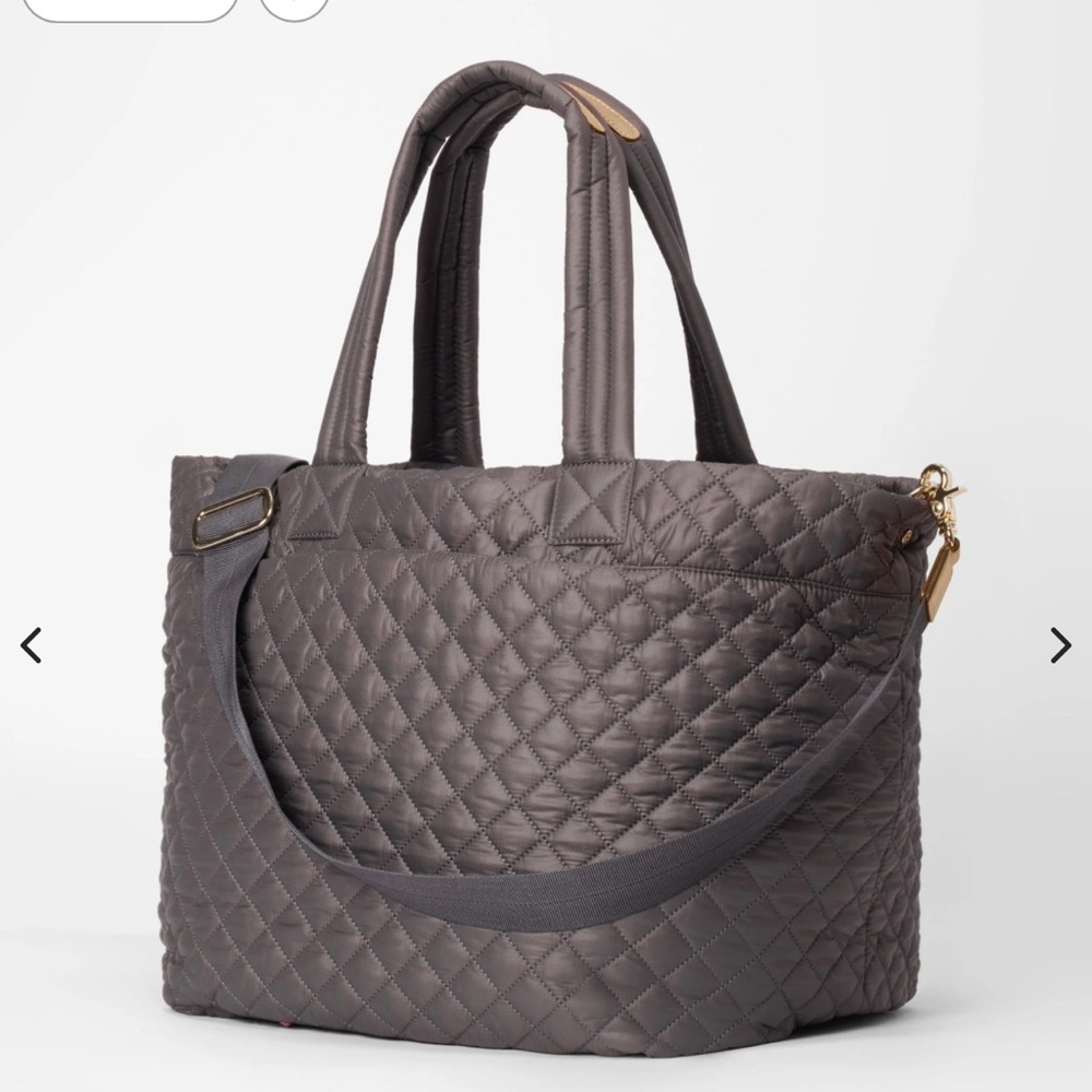 Mz Wallace metro tote deluxe great for traveling with lots of pockets.